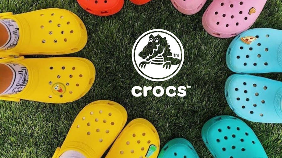 "CrocsFootwear Poster" could be translated to "Crocs fotbeklädnadsaffisch" in Swedish. When it comes to computer or mobile wallpaper, we could say "Ladda ner en skobutiksaffisch med Crocs fotbeklädnad som din dator- eller mobilbakgrundsbild" which means "Download a shoe store poster featuring Crocs footwear as your computer or mobile wallpaper".