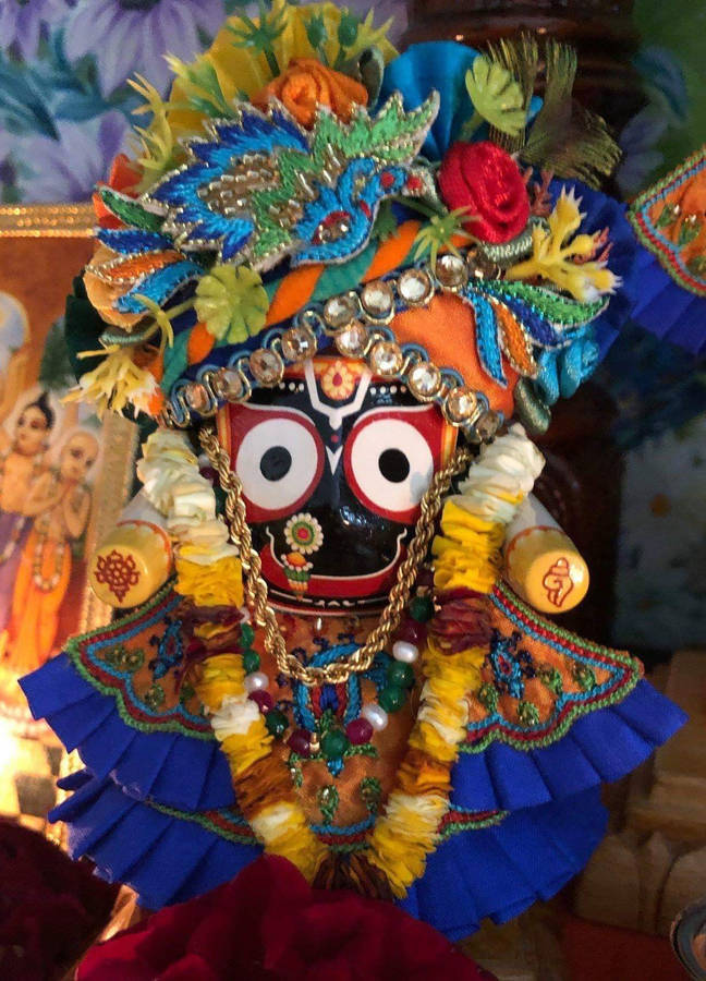 Download Jagannath With Floral Headdress Wallpaper | Wallpapers.com