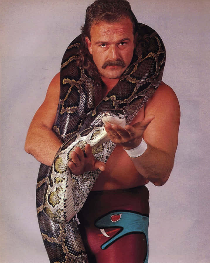 Jake Roberts Posing With A Python