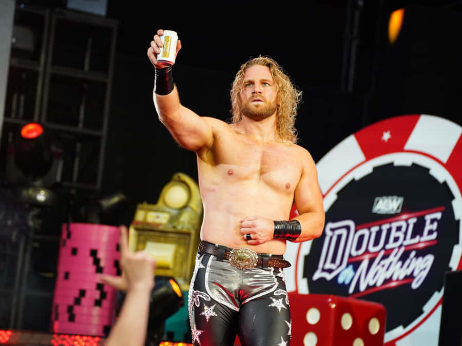 "AdamPage AEW Double or Nothing" can be translated to "Adam Page AEW Double or Nothing" in Swedish. This phrase can be used as a computer or mobile wallpaper with a picture of Adam Page at AEW's Double or Nothing event.