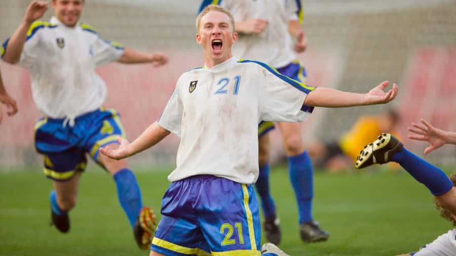 Jogador de Futebol Celebrando Gol