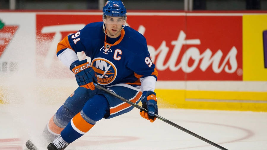 Download John Tavares Of New York Islanders Wallpaper | Wallpapers.com