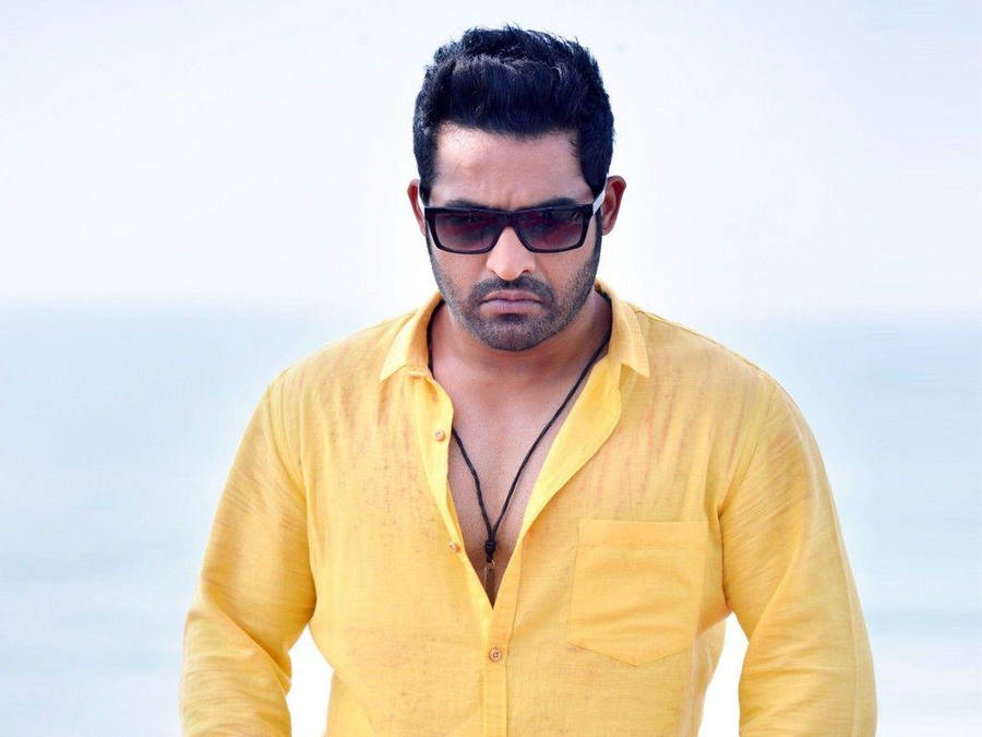 Download Jr Ntr In Yellow Shirt Wallpaper | Wallpapers.com