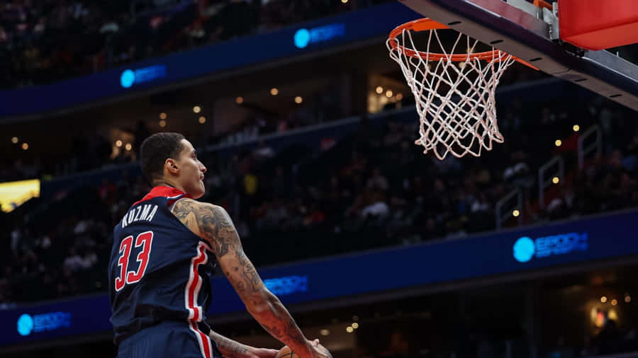 Kyle Kuzma Dunking Action