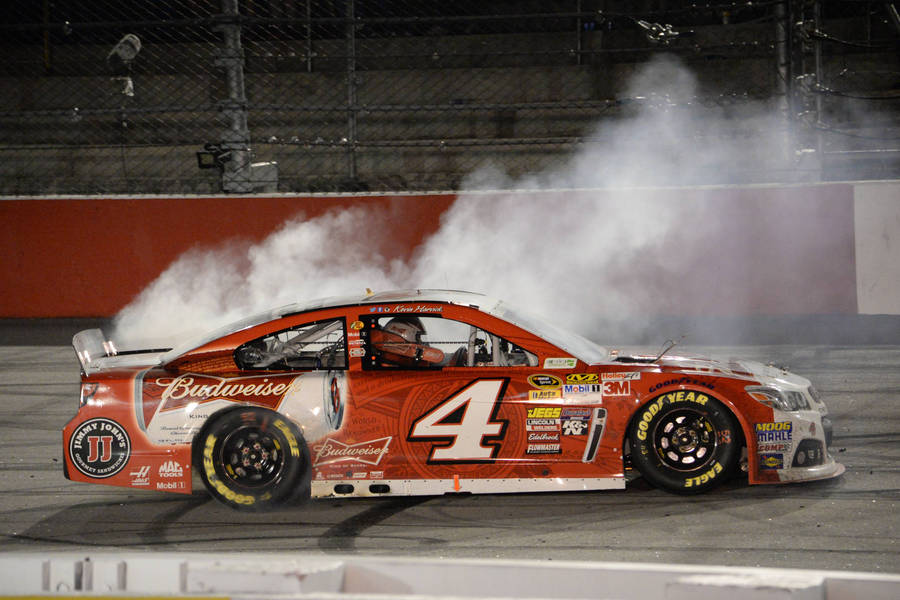 Download Kevin Harvick Steaming Car Wallpaper | Wallpapers.com