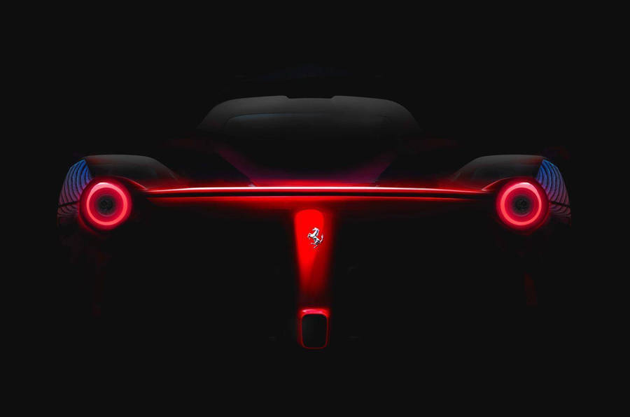LaFerrari glowing red back features black desktop wallpaper. 