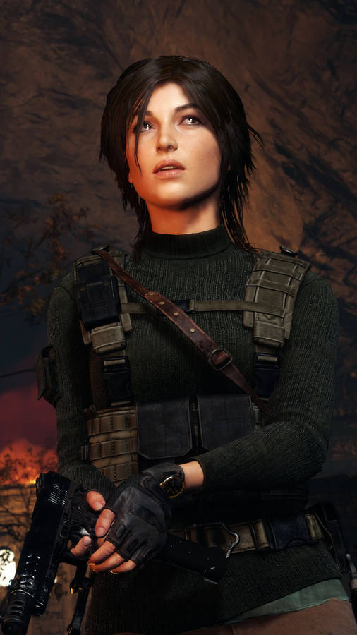 Download Lara Croft In Black Tomb Raider Iphone Wallpaper | Wallpapers.com