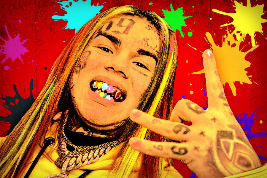 "6ix9inePaint Blot" could be translated to "6ix9ine målarfärg i fläckar" in Swedish. Denna frasen förknippas troligtvis med en dator- eller mobilskärms tapet med en abstrakt blodig design med inslag av rappern 6ix9ine.