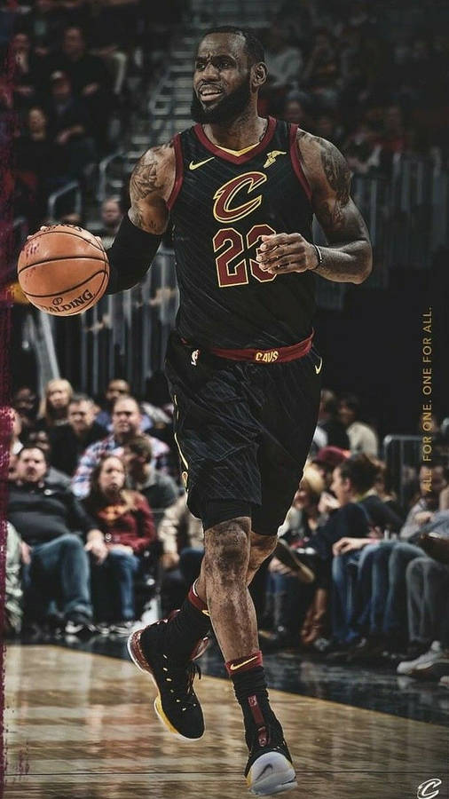 Lebron James in NBA Cavs 23 jersey dribbling in the game wallpaper