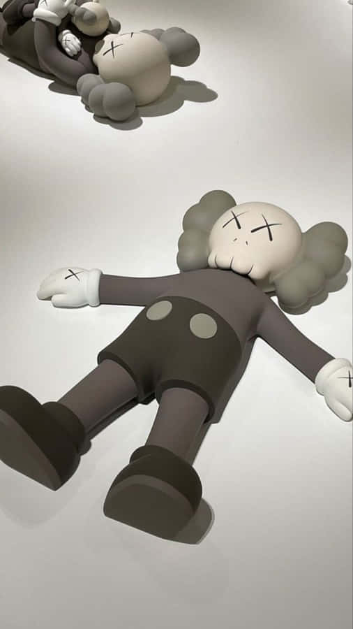 Figure Kaws Companion Sdraiati