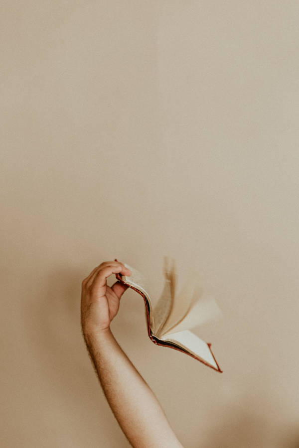 Preview wallpaper book, hand, pages, beige