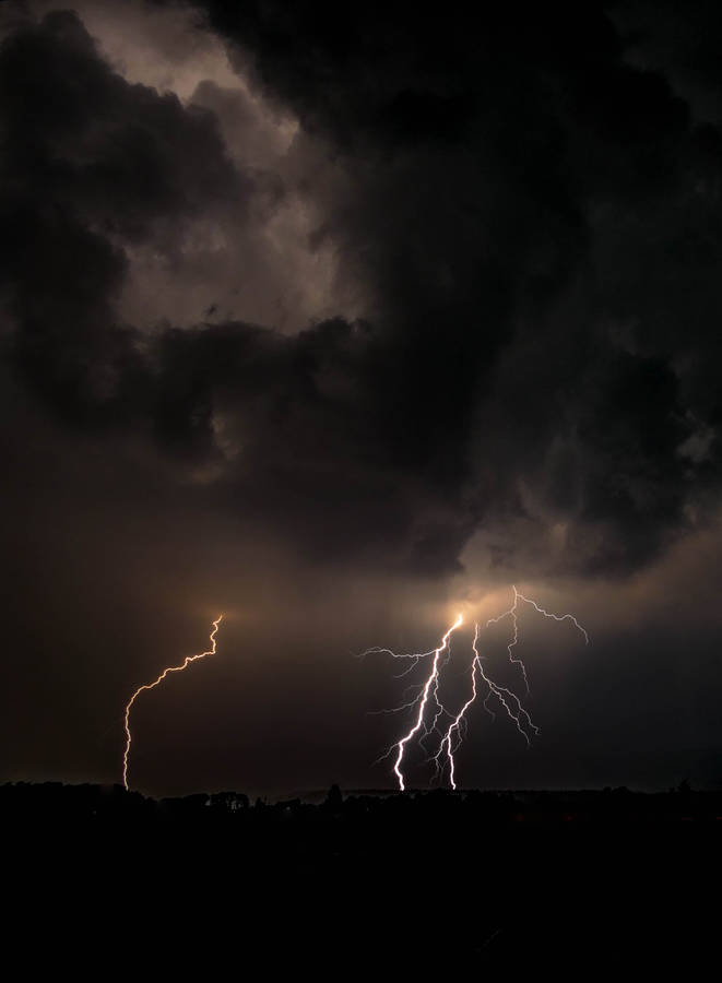 Download Lightning Strikes In Dark Night Wallpaper | Wallpapers.com