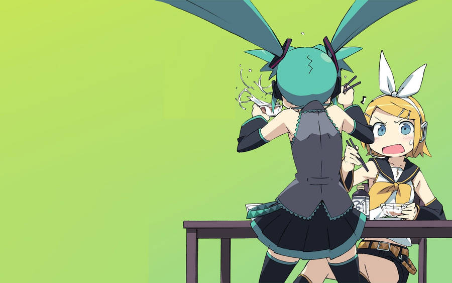 ZweiAnime-Mädchen sitzen an einem Tisch.