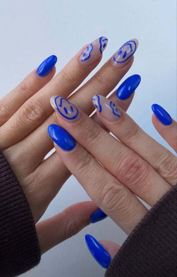 Nail Art con Faccia Sorridente Blu
