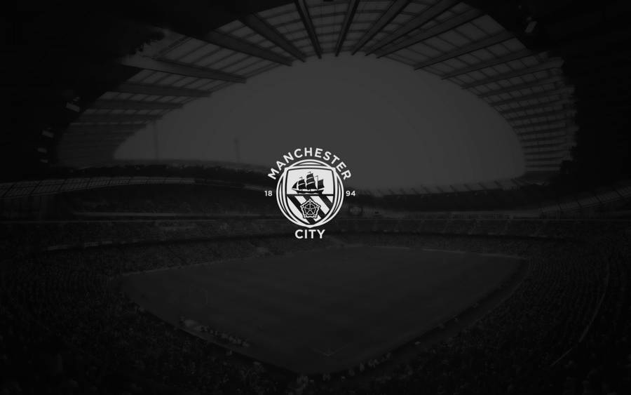 Download Manchester City Black Stadium Logo Wallpaper Wallpapers Com