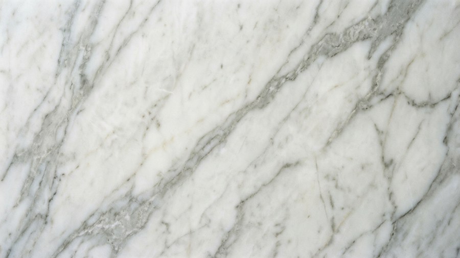 A minimalist marble texture background with subtle grey veins, elegant and timeless.