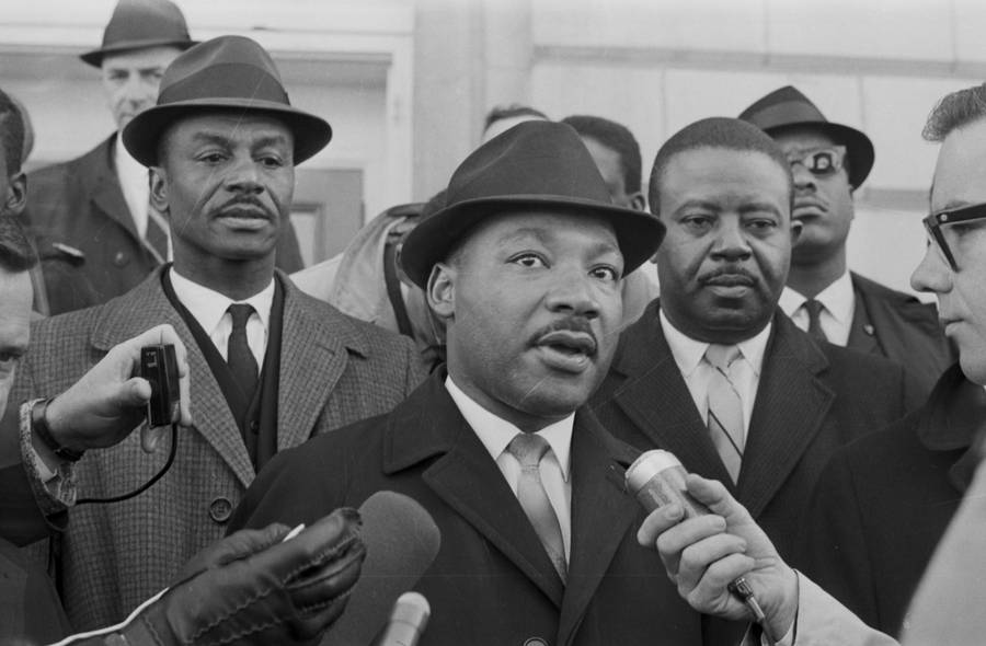 Download Martin Luther King Jr Talking To Press Wallpaper | Wallpapers.com