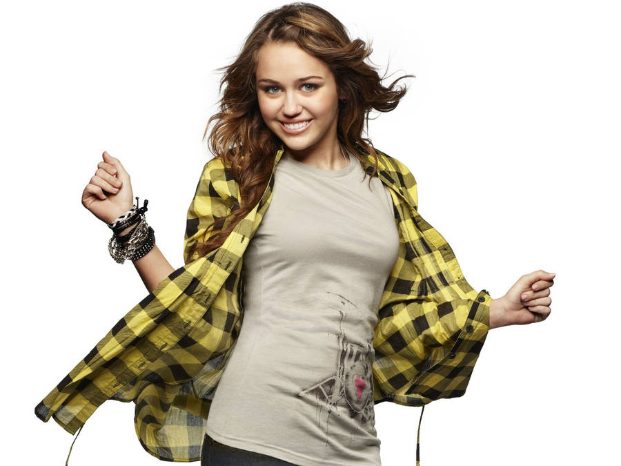 Download Miley Cyrus In Yellow Flannel Wallpaper | Wallpapers.com