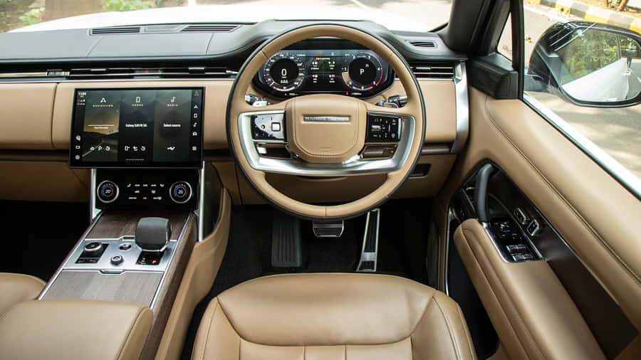 Indersidenaf en Land Rover-bil.