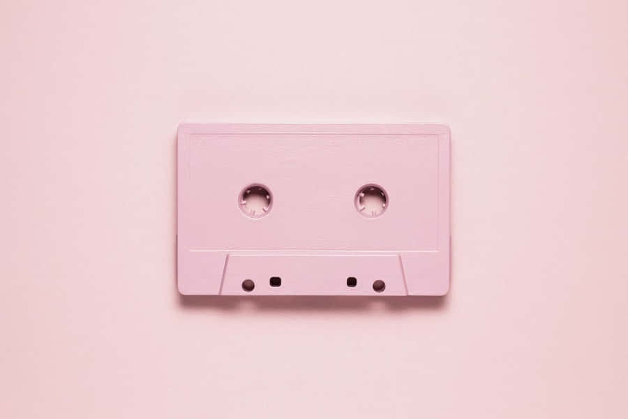 Rosa Kassette auf Pastell Hintergrund