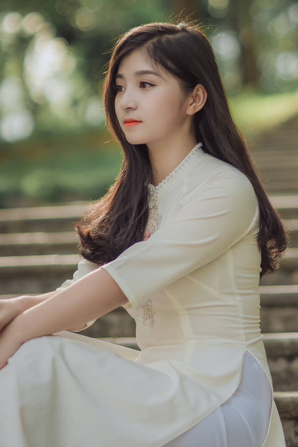 Asian Woman In Elegant White Dress