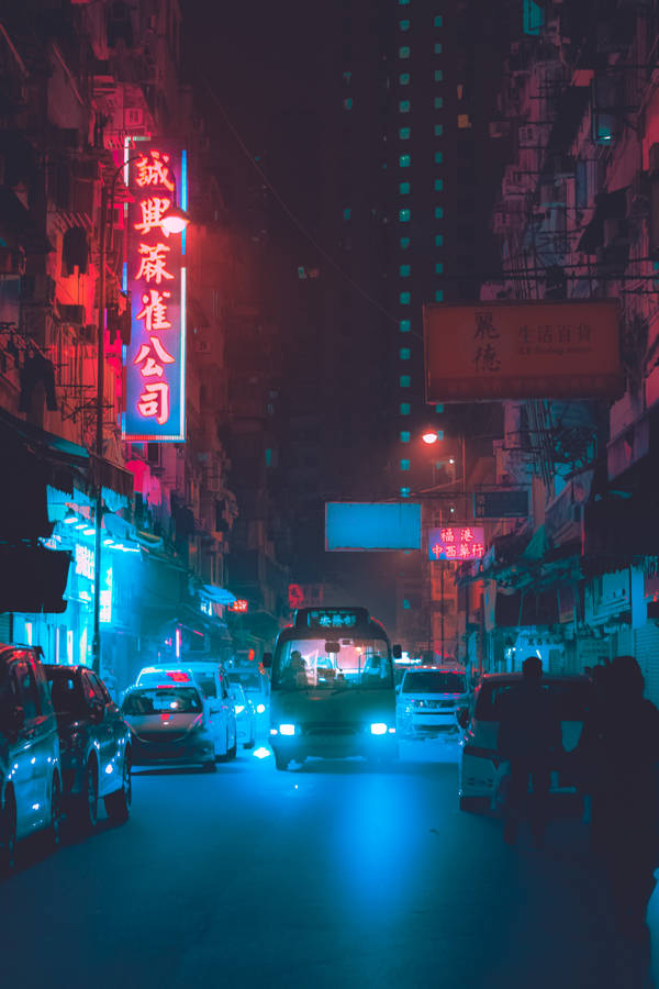 Download Neon Lights Road With Vehicles Wallpaper | Wallpapers.com