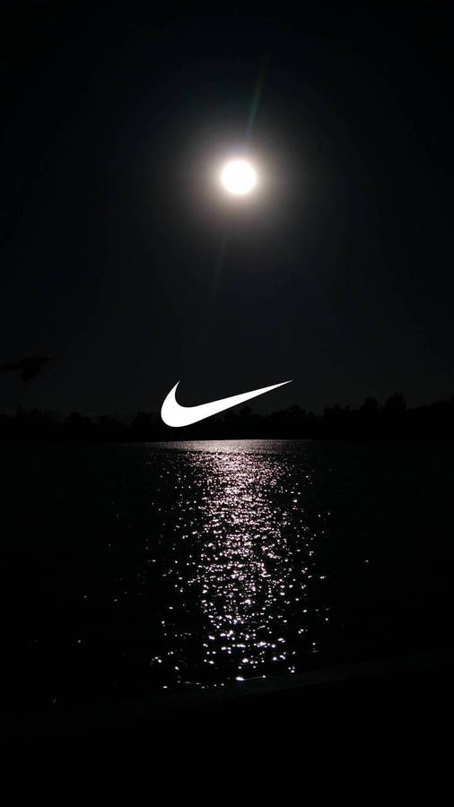 Nike swoosh in the night sky wallpaper