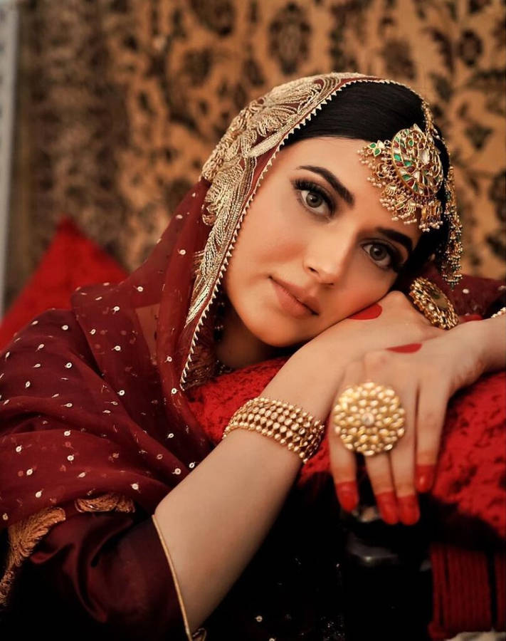 Download Nimrat Khaira With Gold Jewelry Wallpaper | Wallpapers.com