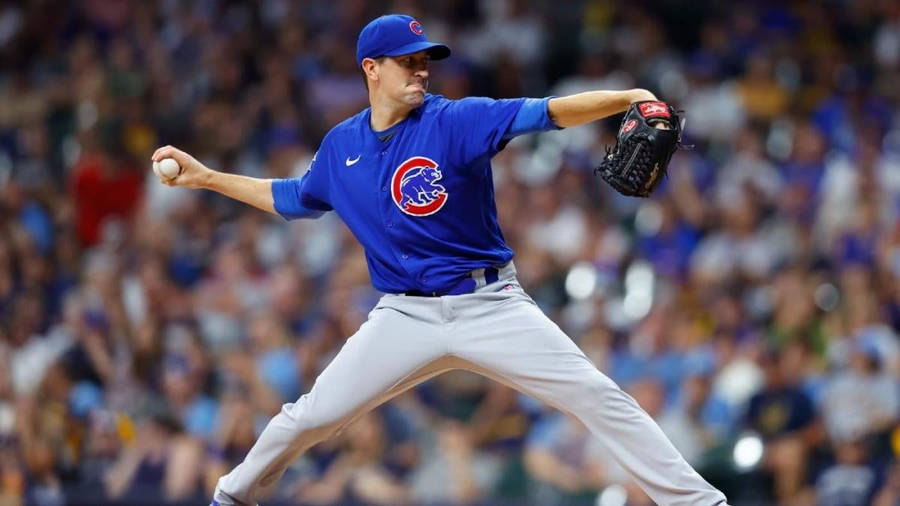 KyleHendricks kaster med kraft og præcision i sin pitching-position.