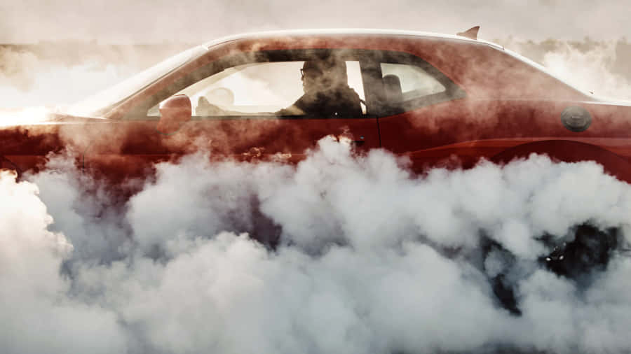 Röd bil burnout rök