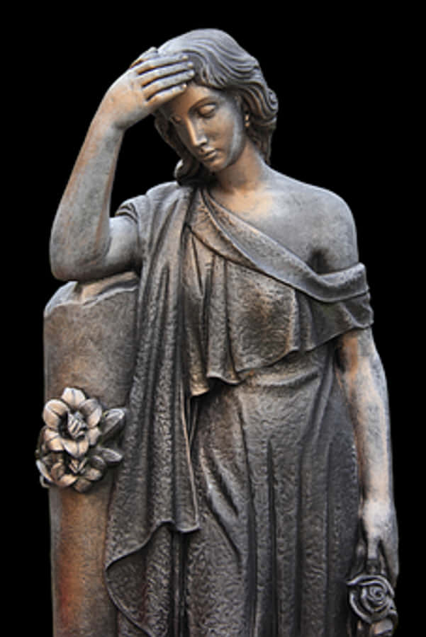 Contemplative Female Statuewith Roses