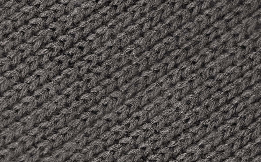 Nahaufnahme graue Stricktextur