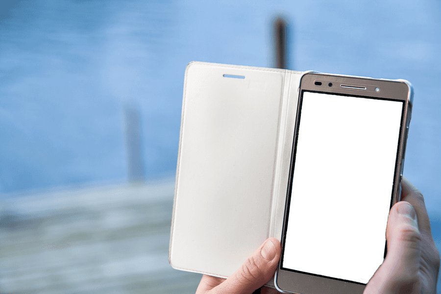 Smartphone Held Against Blurry Background