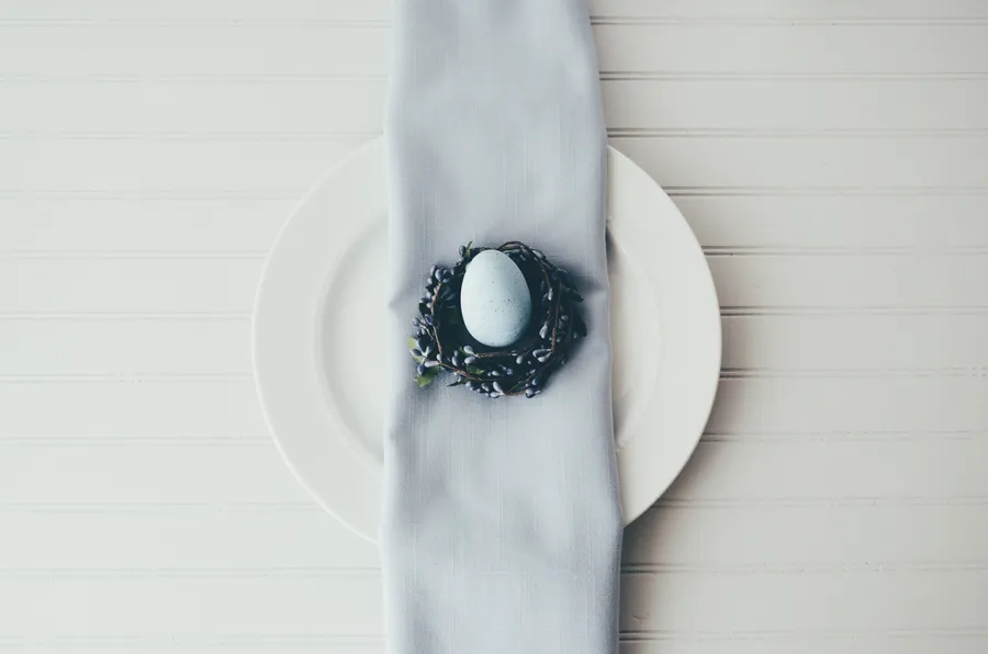 White Easter egg on a simple plate, Easter wallpaper