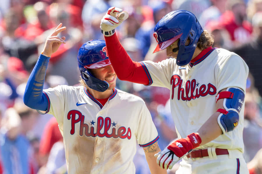 Giocatori dei Phillies che Celebrano un Colpo