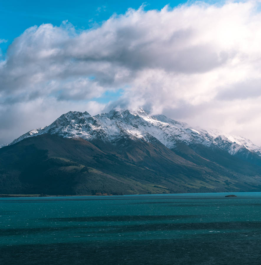 Download Papua New Guinea Snow Capped Mountain Wallpaper | Wallpapers.com