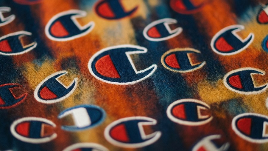 Repeating Champion logo pattern on fabric