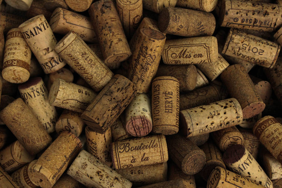 Download Pile Of Wine Corks Wallpaper | Wallpapers.com