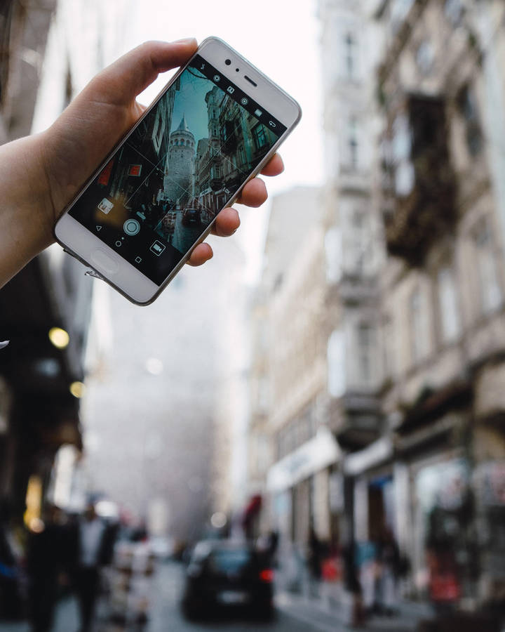 Fotografiadi strada con il telefono cellulare