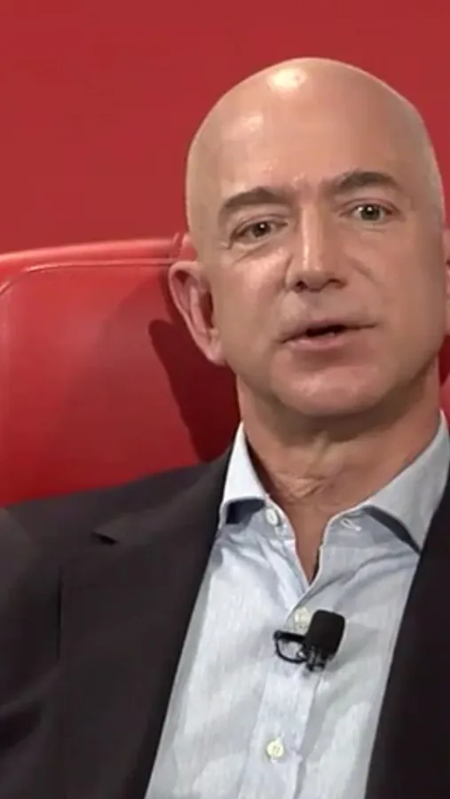 Jeff Bezos Over A Red Backdrop
