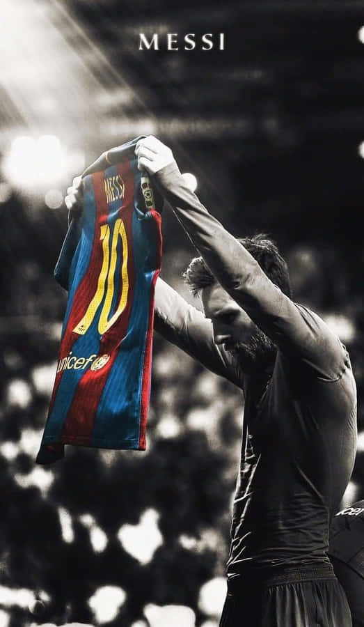 Messi hält Barcelona Trikot
