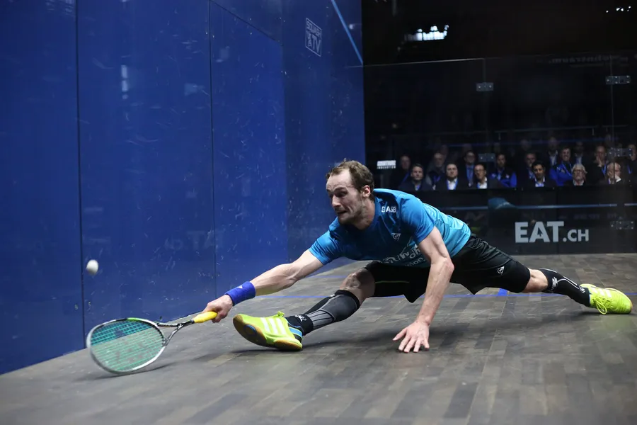 Man Splits While Playing Squash