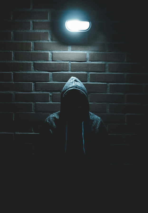 Mysterisk Huva Figur i Mörker