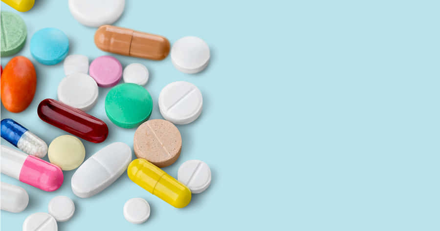 Imagemminimalista de pílulas de medicamento.