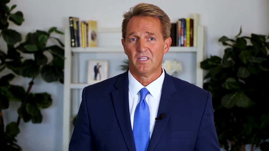 JeffFlake vestindo terno e gravata.