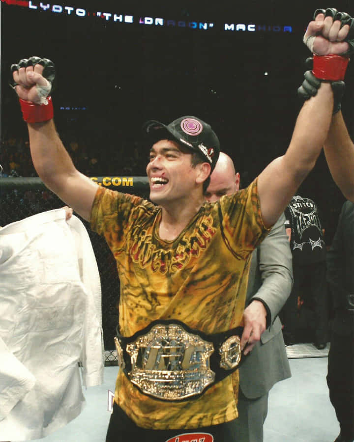 Smiling Lyoto Machida Raising Arm