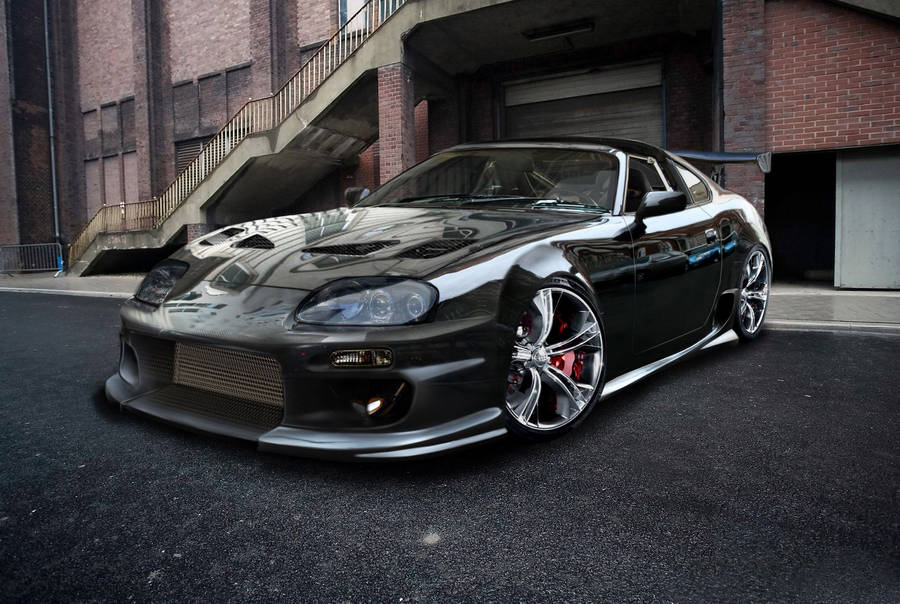 Download Shiny Black Toyota Supra Car Wallpaper | Wallpapers.com