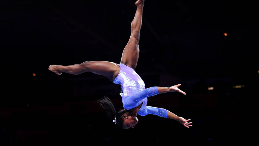 Download Simon Biles Backward Flip Wallpaper | Wallpapers.com