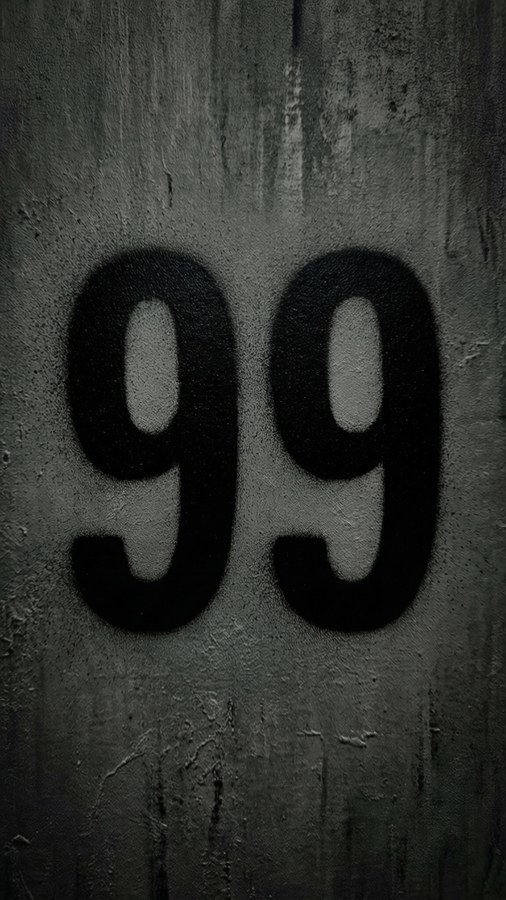 Number 99 in matte black on dark background, barely visible.