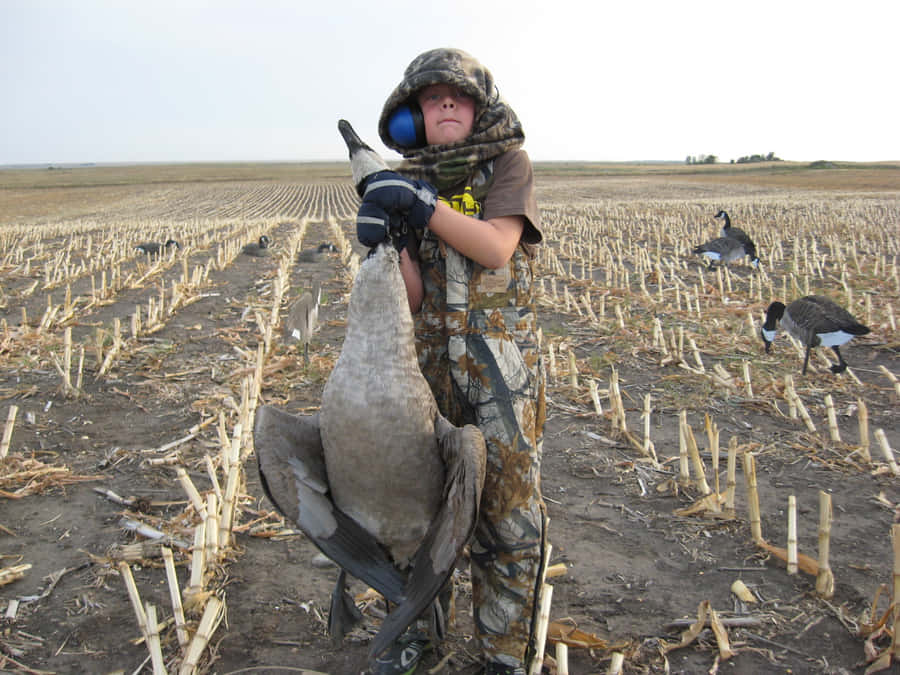 Hunter Standing On Field